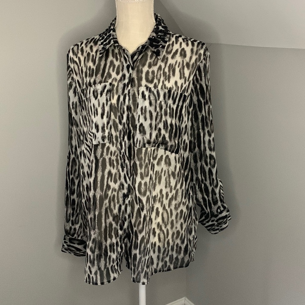 Woman shirt, light used.